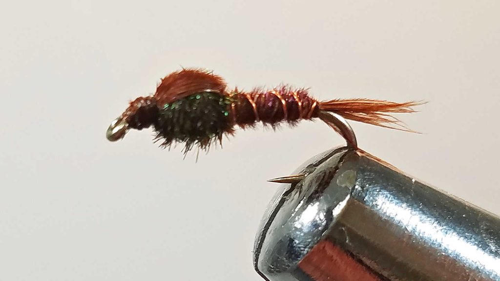 Beadhead nymph in a vise